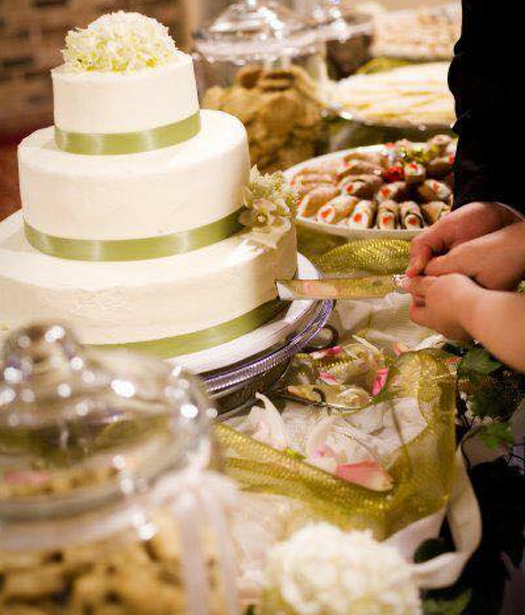 Closeup of cutting cake