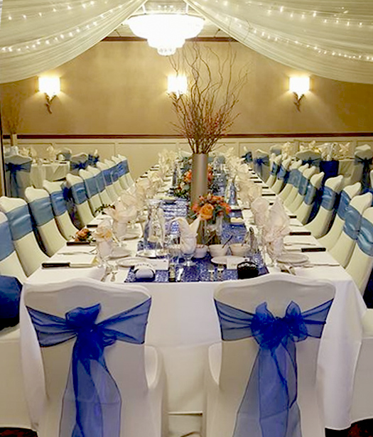 Wedding reception area with gold candles
